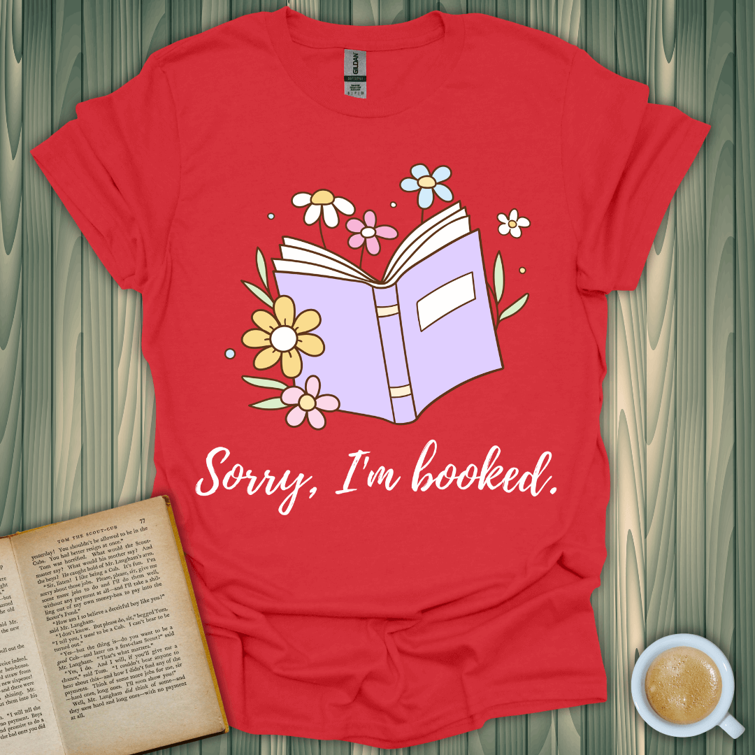 Sorry, I'm Booked T-Shirt for book lovers, featuring a colorful book and floral design, perfect for any casual occasion.