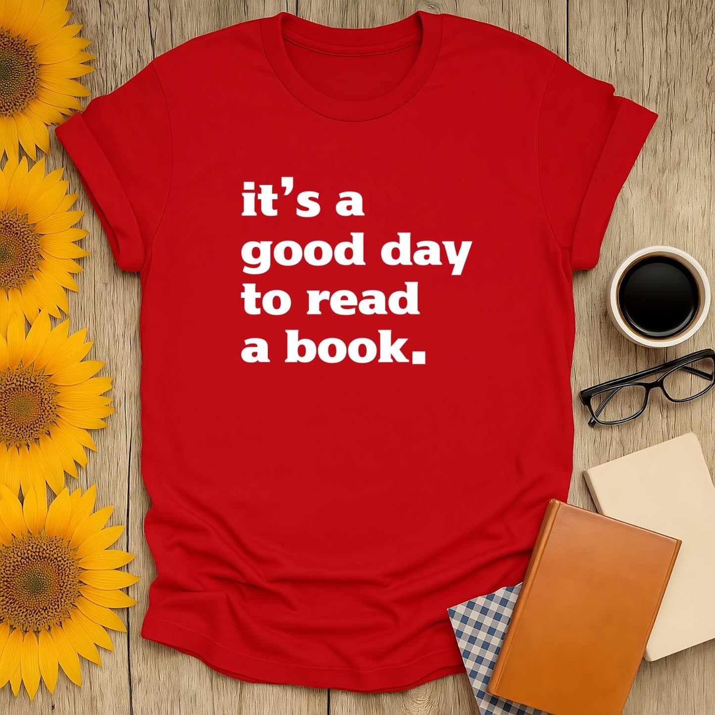 Red t-shirt with white text saying 'it's a good day to read a book,' perfect for book lovers who enjoy cozy moments.