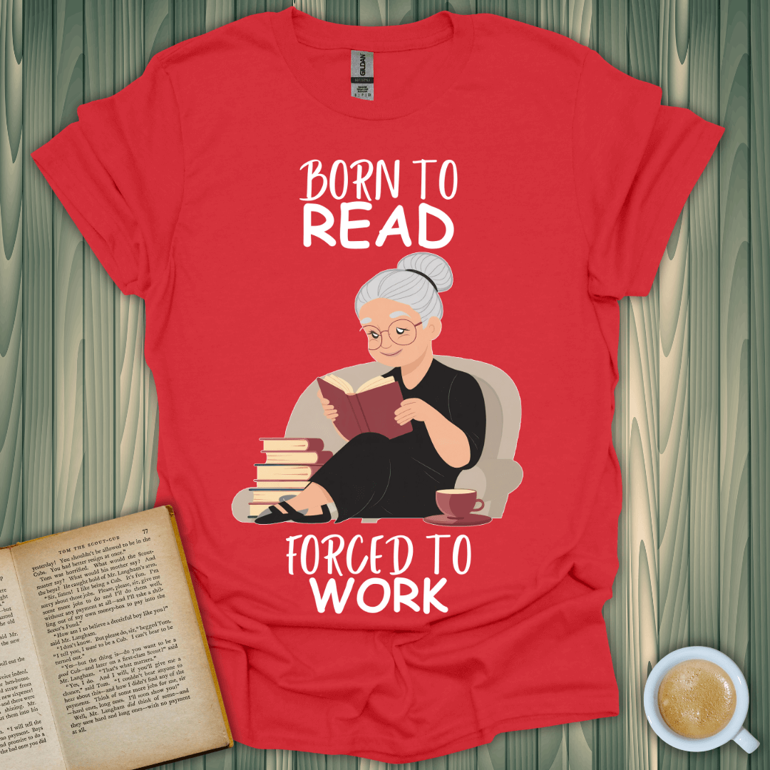 Born to Read, Forced to Work t-shirt featuring a book lover enjoying a good book in a cozy setting.