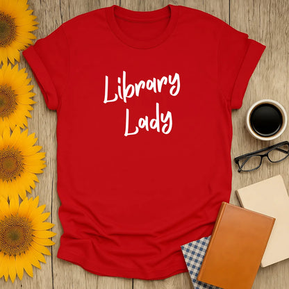 Red t-shirt with "Library Lady" text, perfect cozy book shirt for cat and coffee lovers, great gift for bookworms.