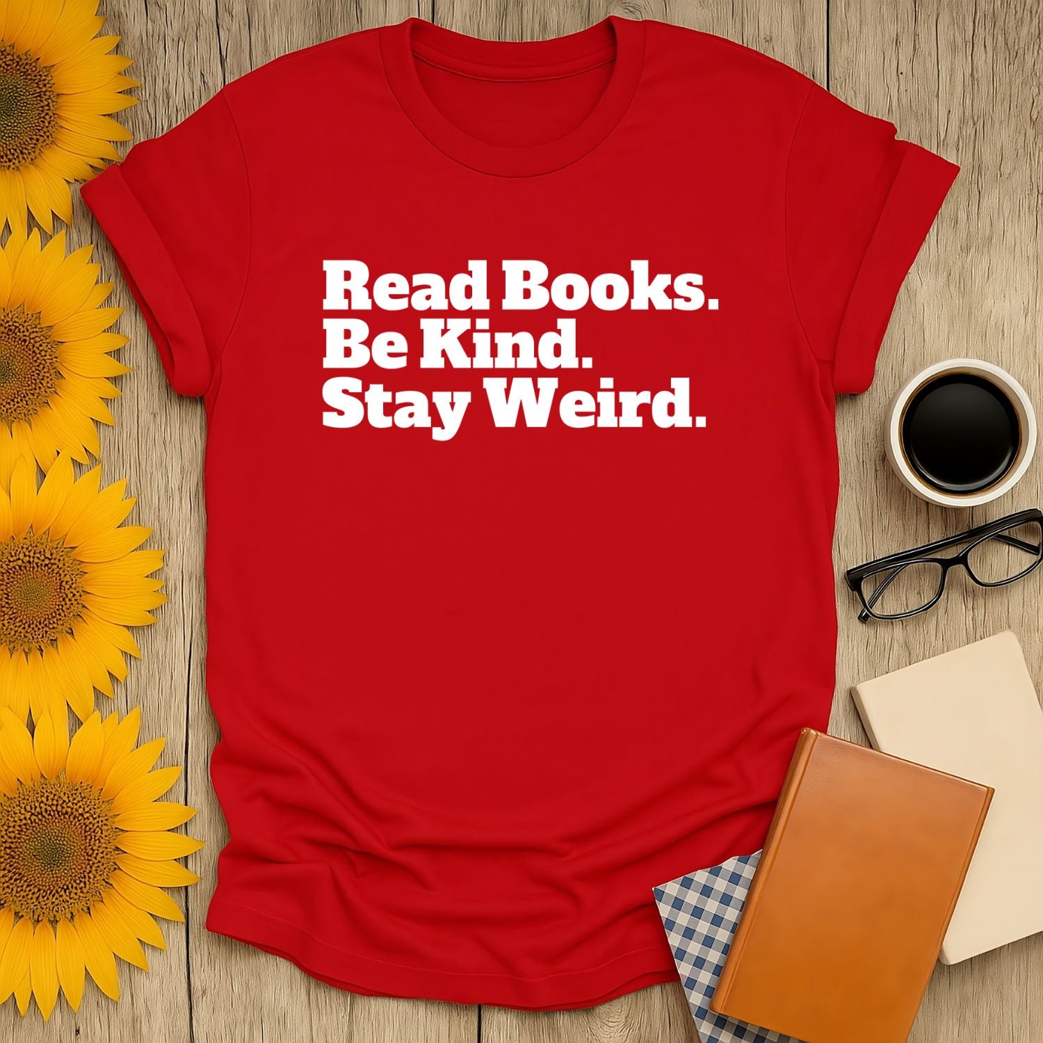 Red Unisex T-Shirt with bold text: 'Read Books. Be Kind. Stay Weird.' Perfect for book lovers and cozy reading vibes.