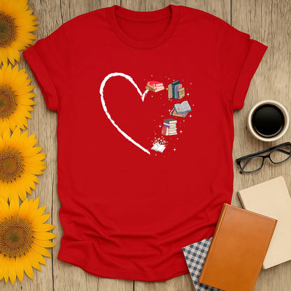Bookish Heart T-Shirt features a heart made of books, perfect for book lovers who cherish cozy moments with cats and coffee.