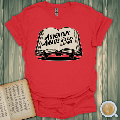 Adventure Awaits T-Shirt with book design for book lovers, unisex fit in vibrant red, perfect for readers and adventurers.