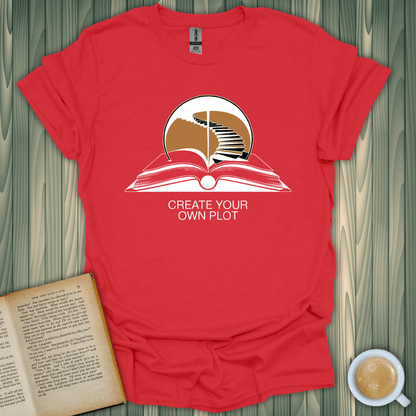 Red unisex t-shirt with 'Create Your Own Plot' graphic, perfect for book lovers and crafted from soft, breathable cotton.