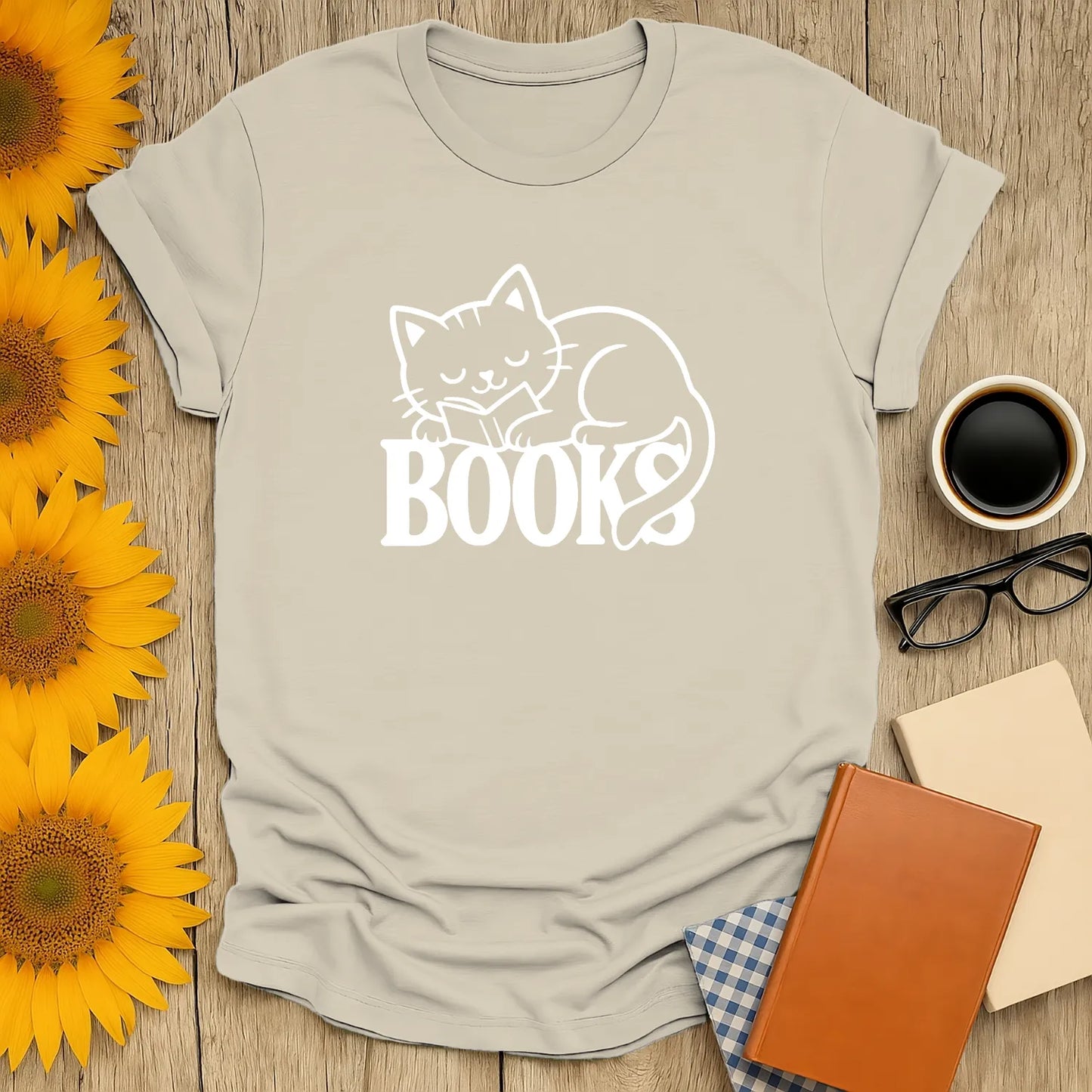 Cozy cat reading shirt with a sleeping cat illustration and 'BOOKS' text, perfect for book lovers and gifts.