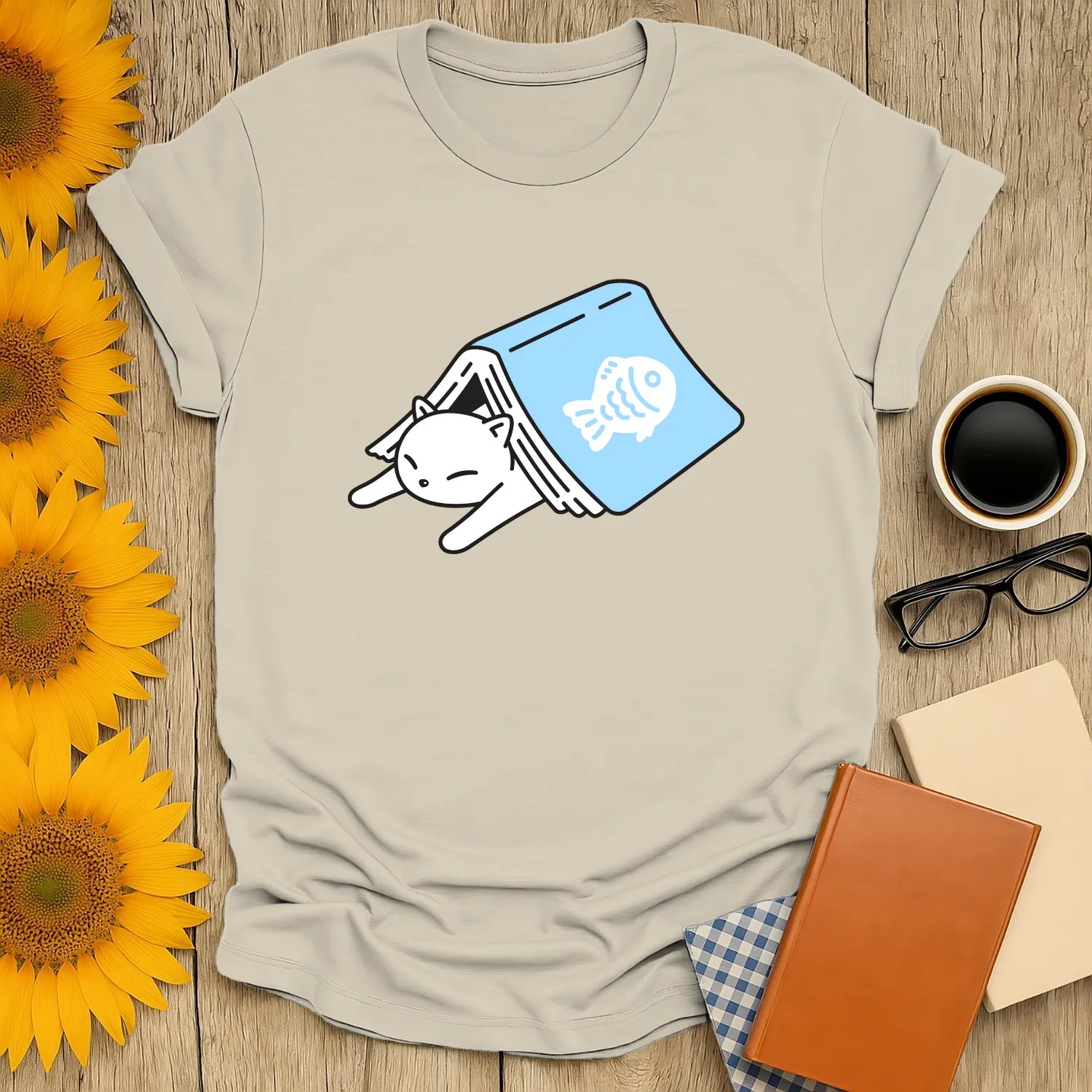 Cute cat hiding in a book with a fish print, perfect for book lovers and cat fans. A cozy gift for readers!