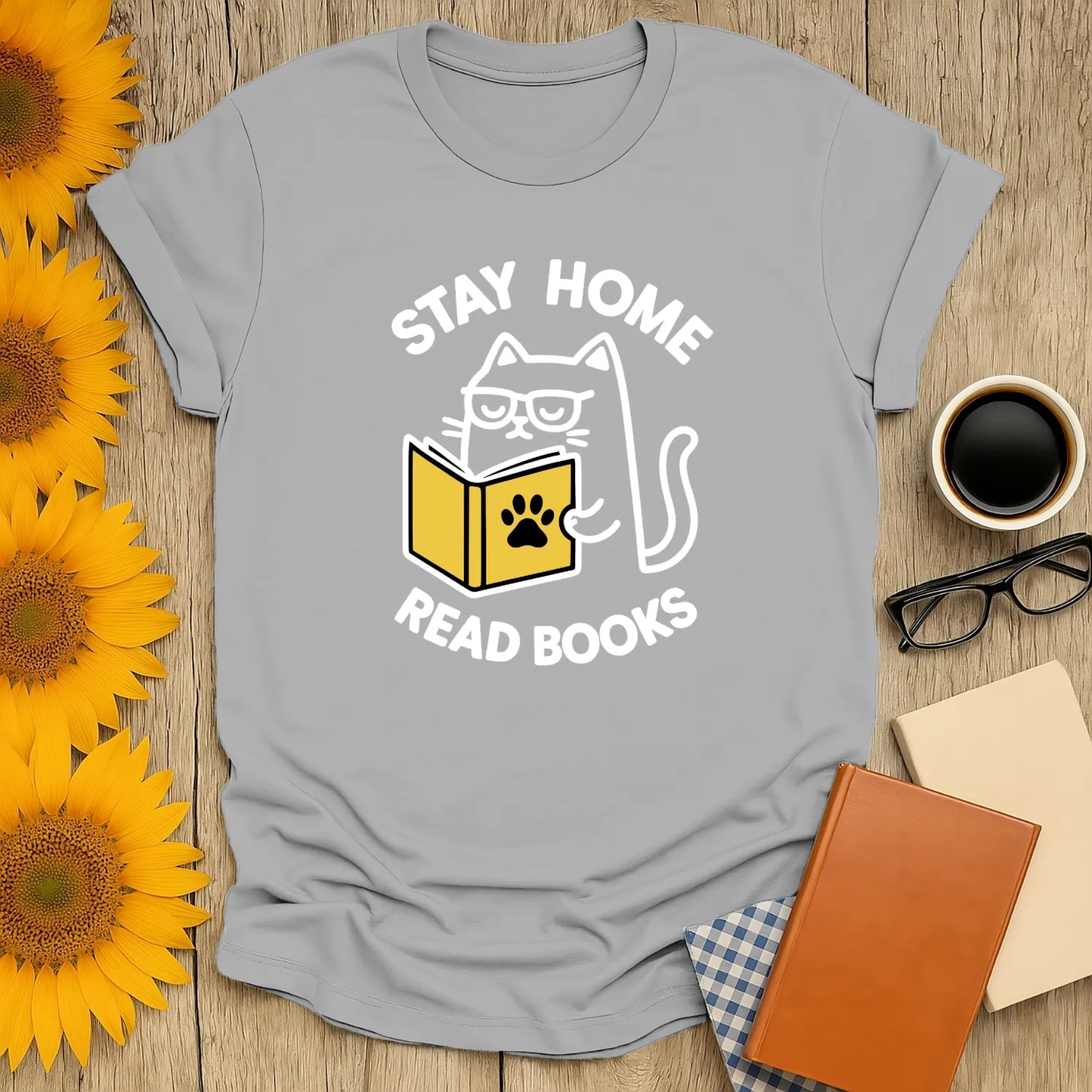 Funny cat reading shirt with text 'Stay Home Read Books', perfect for book lovers and cozy evenings.
