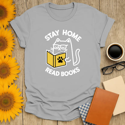 Funny cat reading shirt with text 'Stay Home Read Books', perfect for book lovers and cozy evenings.