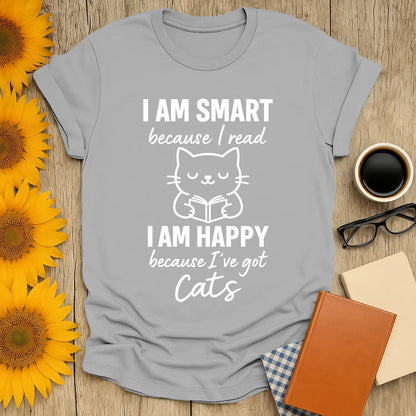 Cozy I Am Smart & Happy t-shirt featuring a cat reading with the text: 'I AM SMART because I read' and 'I AM HAPPY because I've got Cats'.