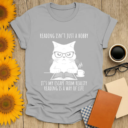 Funny reading tee with a grumpy cat in glasses, coffee, and a book, perfect for book lovers and cozy reading moments.