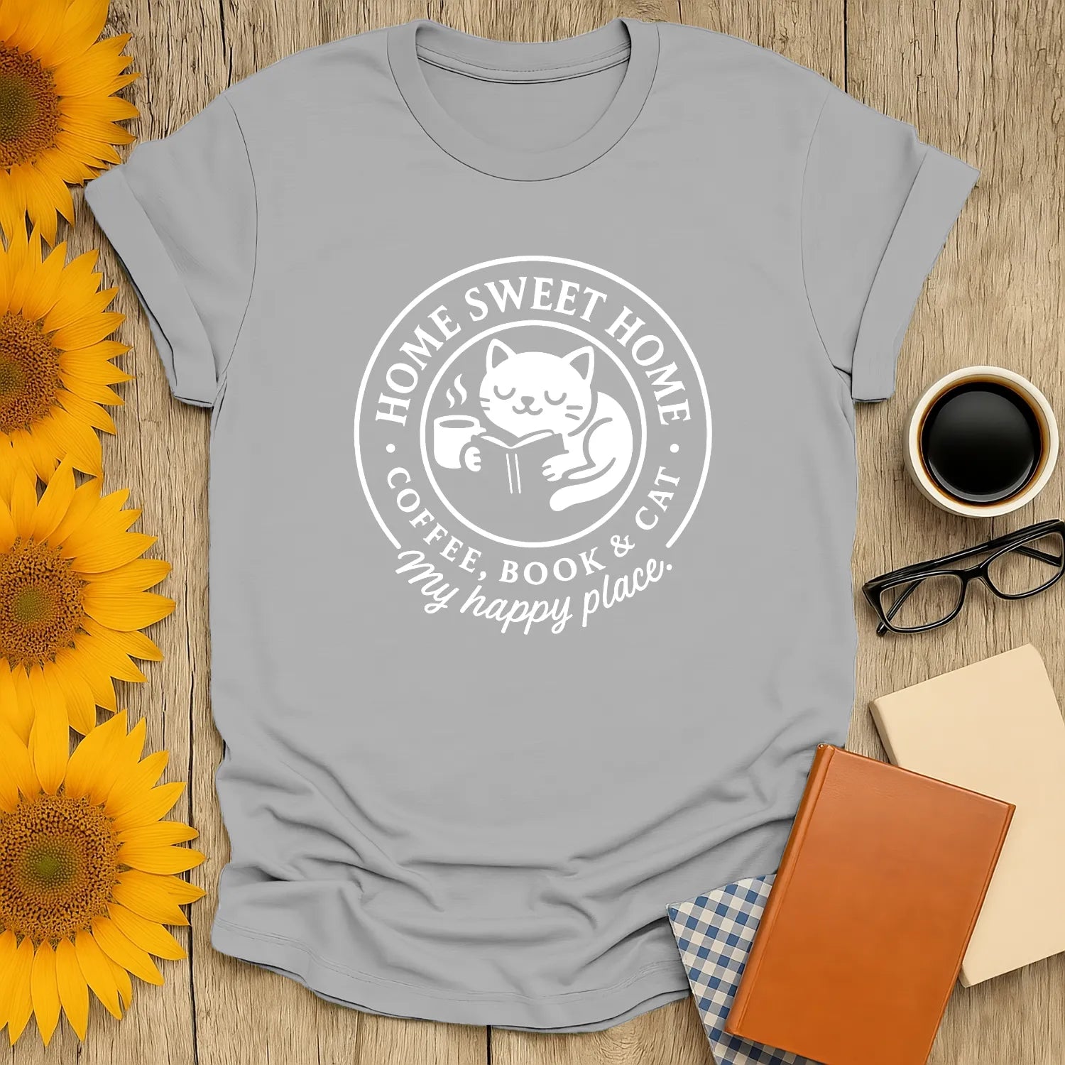 Cozy cat reading shirt featuring a cat, coffee, and book with text: 'Home Sweet Home'. Perfect gift for reading cat lovers.