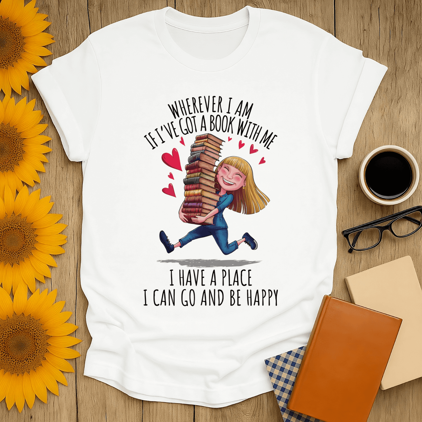 Book lover t-shirt featuring a cheerful design with a girl holding stacked books, expressing love for reading.