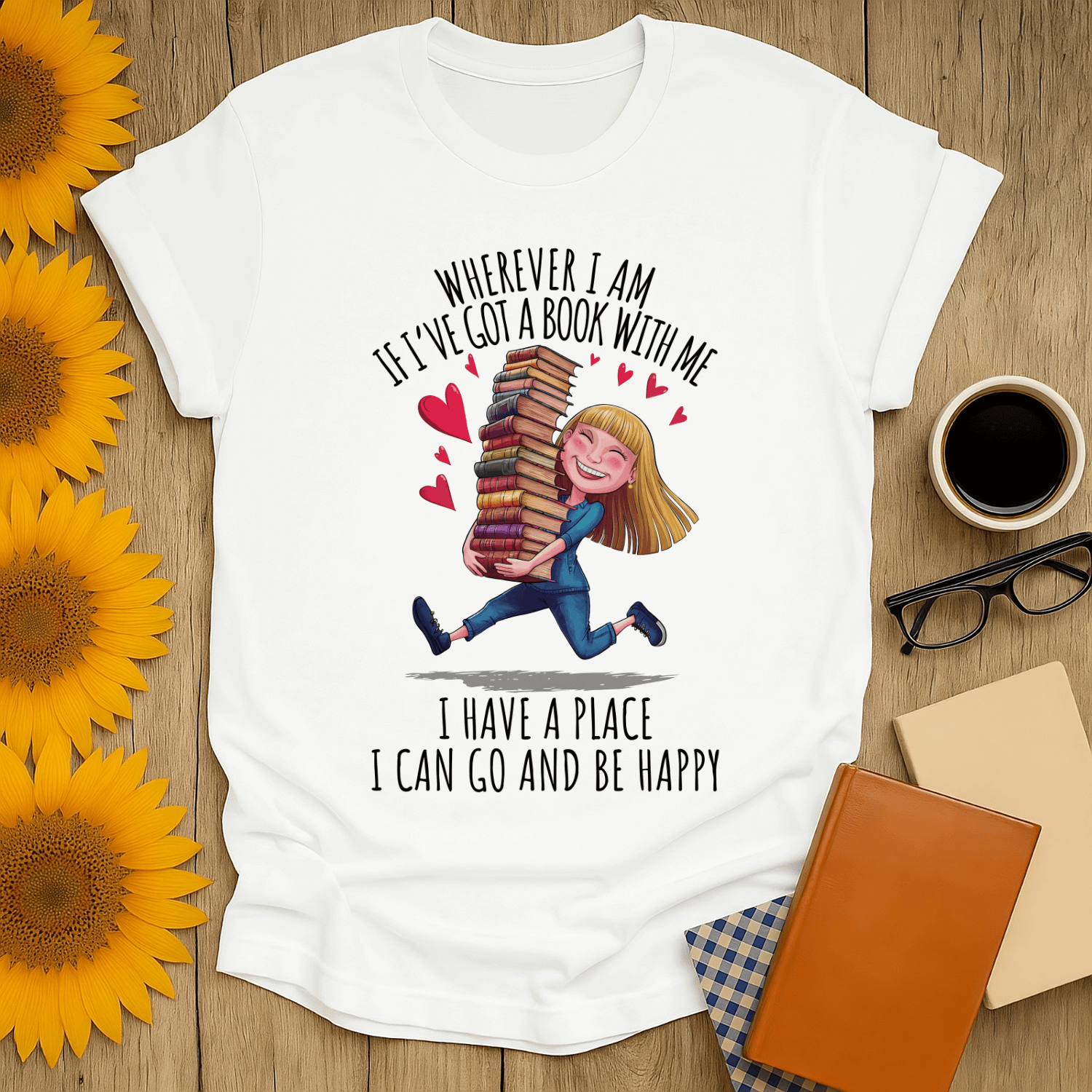 Book lover t-shirt featuring a cheerful design with a girl holding stacked books, expressing love for reading.