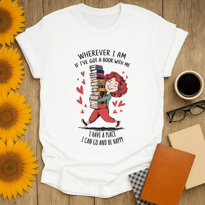 Book lover shirt featuring a joyful person with books, saying "Wherever I am, if I've got a book with me, I can go and be happy!" Perfect gift for readers!