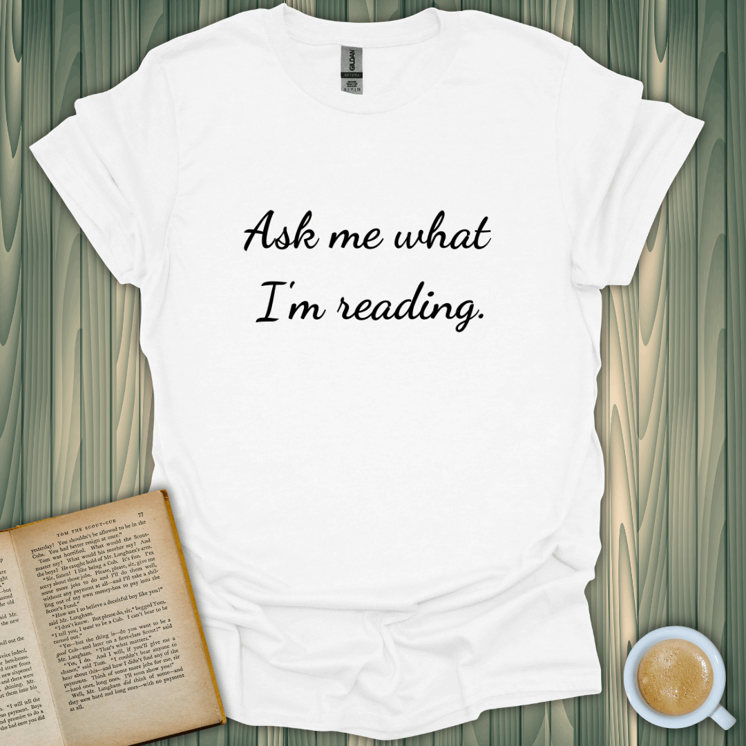 Unisex Ask Me T-Shirt for book lovers, featuring a humorous quote, crafted from 100% ring-spun cotton, lightweight and breathable.