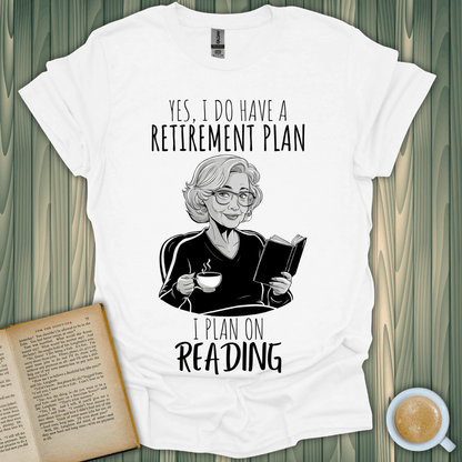 Retirement Plan 2 T-Shirt for book lovers featuring a woman reading with a cup of tea and playful text.