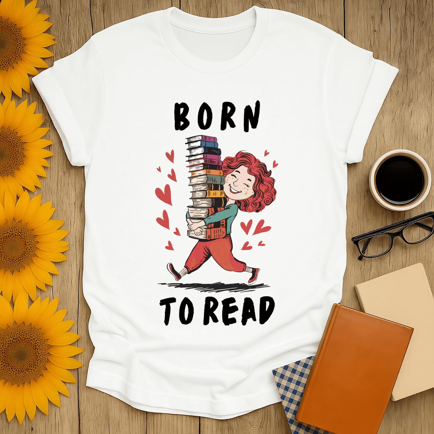 Cute graphic tee featuring a girl carrying books with the text 'Born to Read', perfect for book lovers.