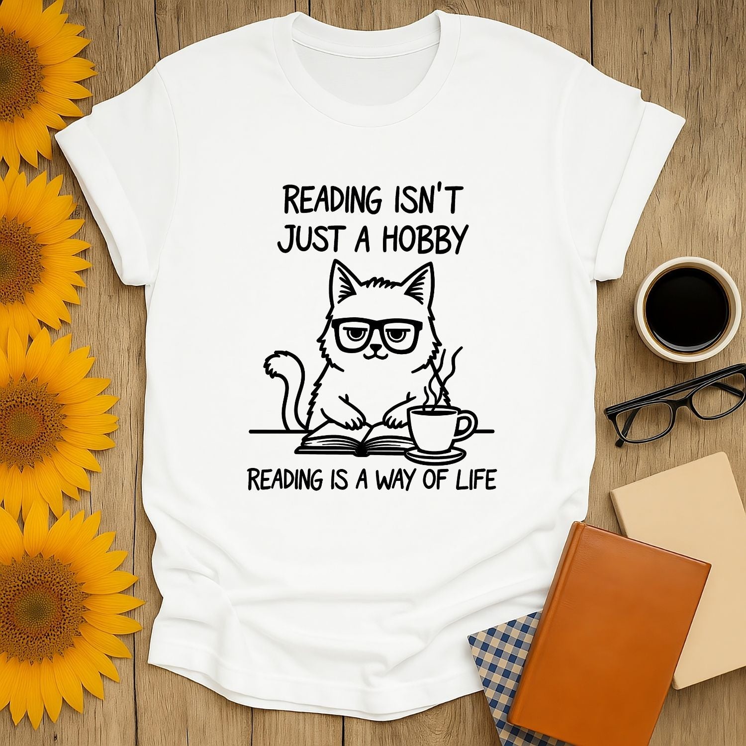 Cute cat illustration on a white t-shirt with quotes about reading as a lifestyle, perfect for book lovers.