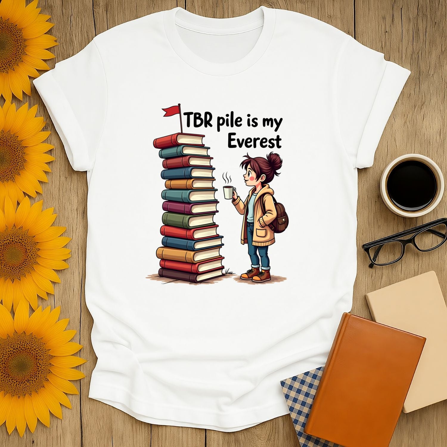 Bookish Everest T-shirt for book lovers; features a playful design with a stack of books, perfect for reading enthusiasts.