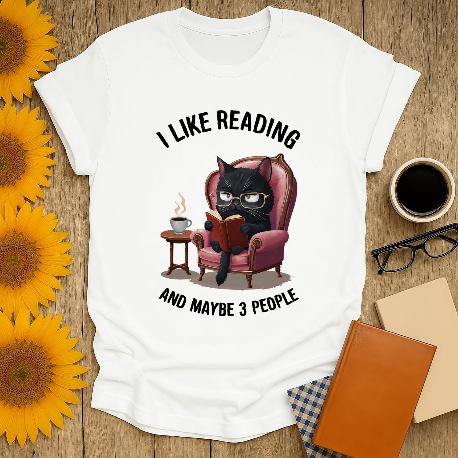 Reading & Few Friends T-Shirt featuring a cat in glasses, perfect for book lovers.