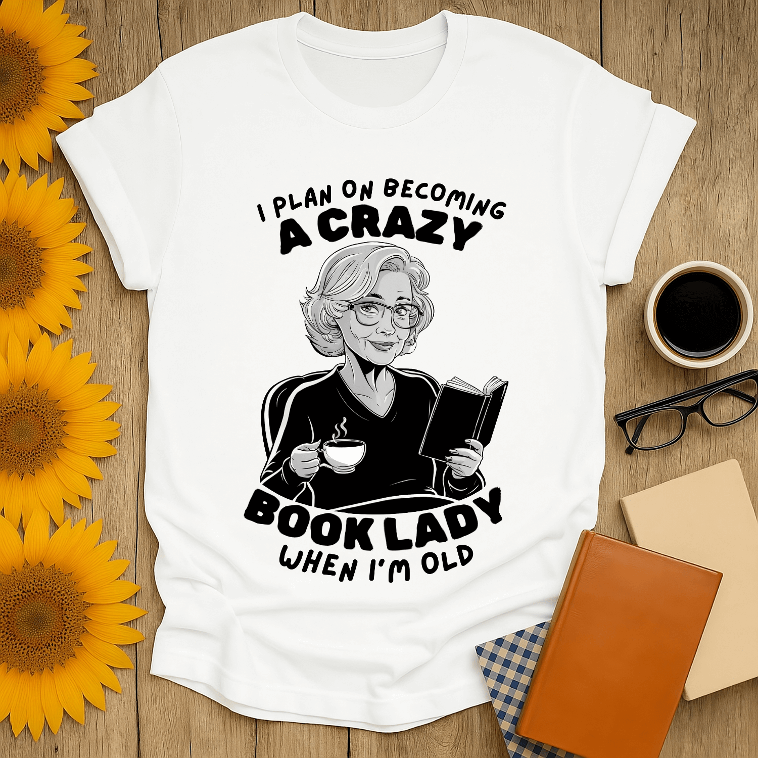 Crazy Book Lady t-shirt for book lovers featuring a woman reading with tea, perfect for any bibliophile.