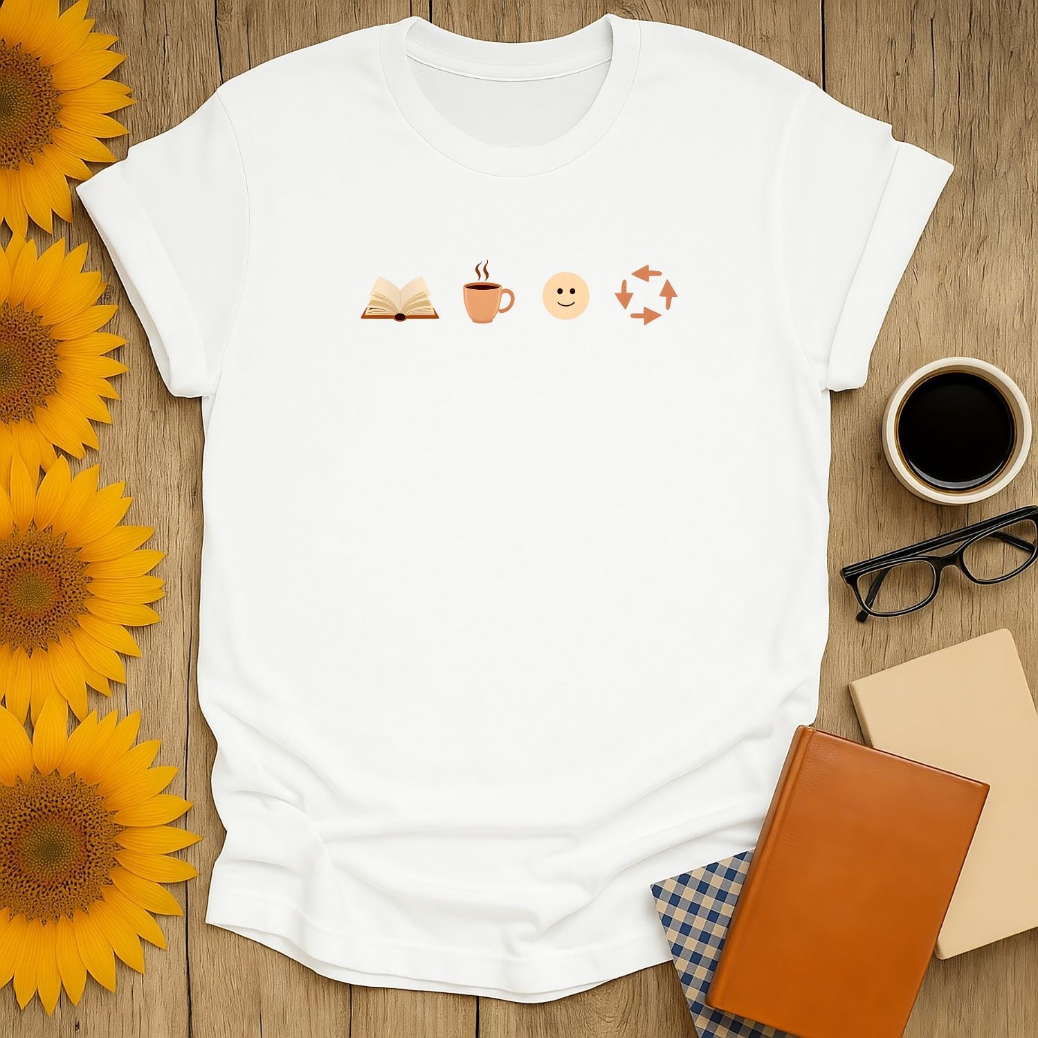 Cozy book lover shirt featuring a book, coffee cup, smiley face, and arrows—perfect for readers who adore cats and comfy vibes!
