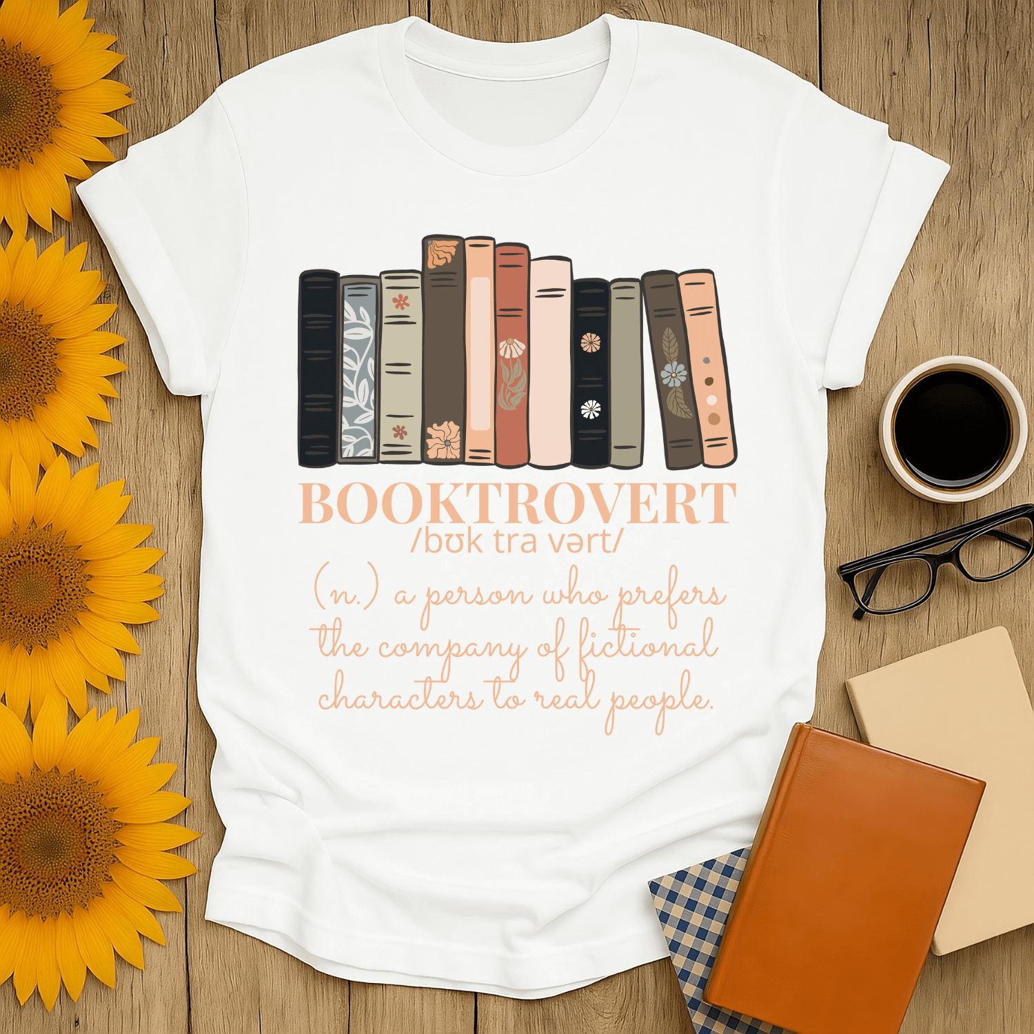 Booktrovert T-Shirt featuring books and text definition. Perfect for book lovers, made from 100% ring-spun cotton.