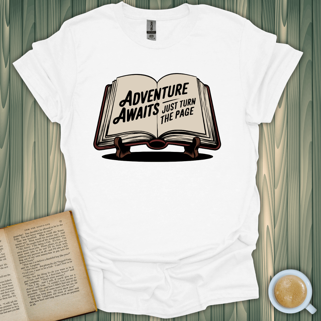 Adventure Awaits T-Shirt featuring a book design, perfect for book lovers. Comfortable, unisex fit for all adventures.