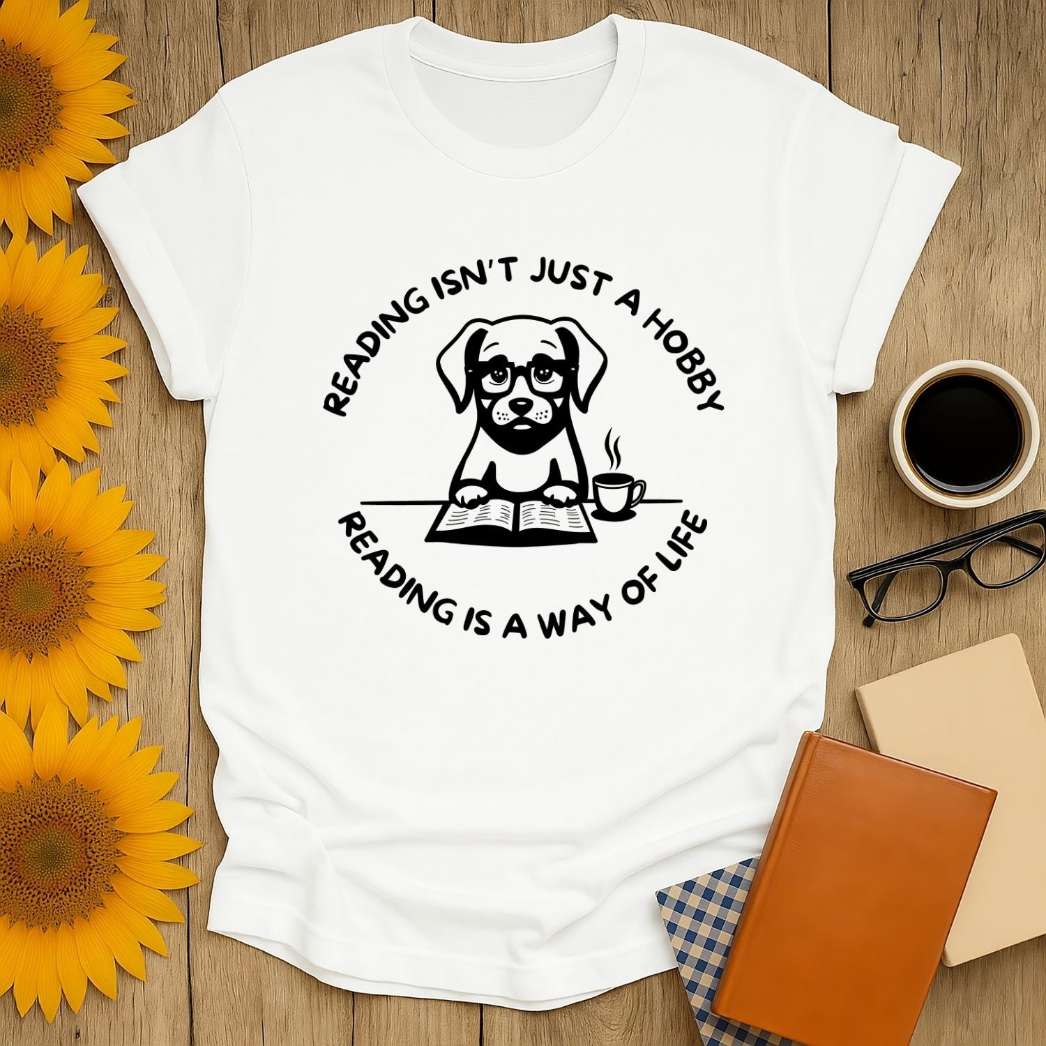 White t-shirt featuring a dog with the quote 'Reading isn't just a hobby, reading is a way of life.'