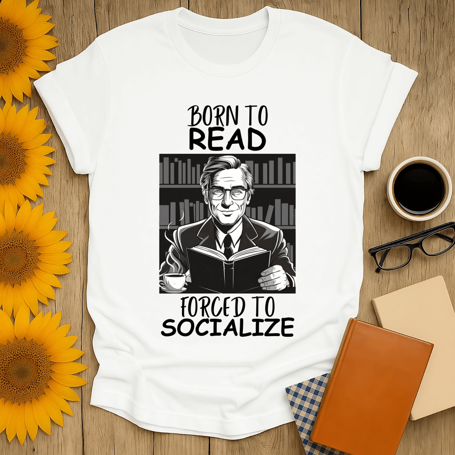 Born to Read, Forced to Socialize T-Shirt for book lovers, featuring a graphic print and comfortable fit.