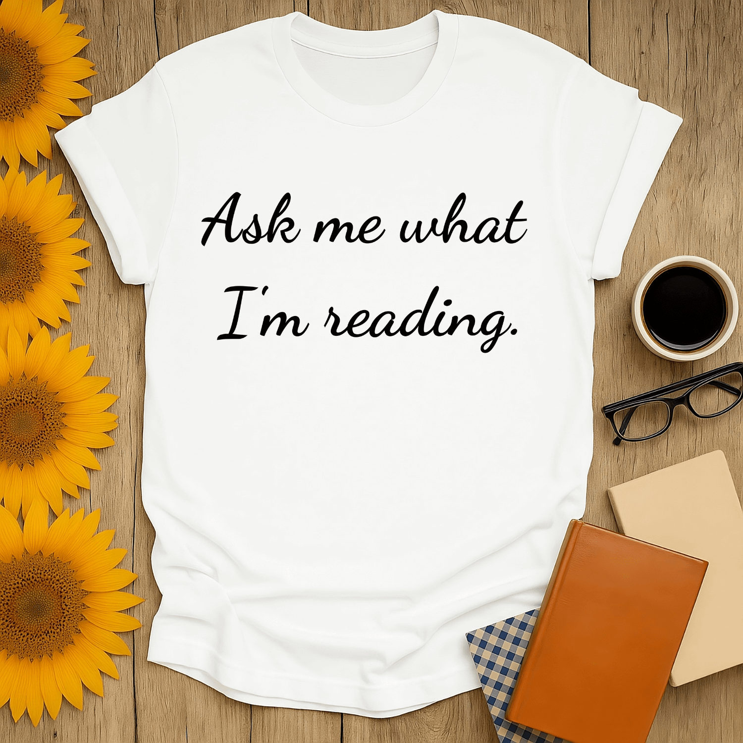 Ask Me T-Shirt for book lovers, featuring a playful reading quote, crafted from 100% ring-spun cotton.
