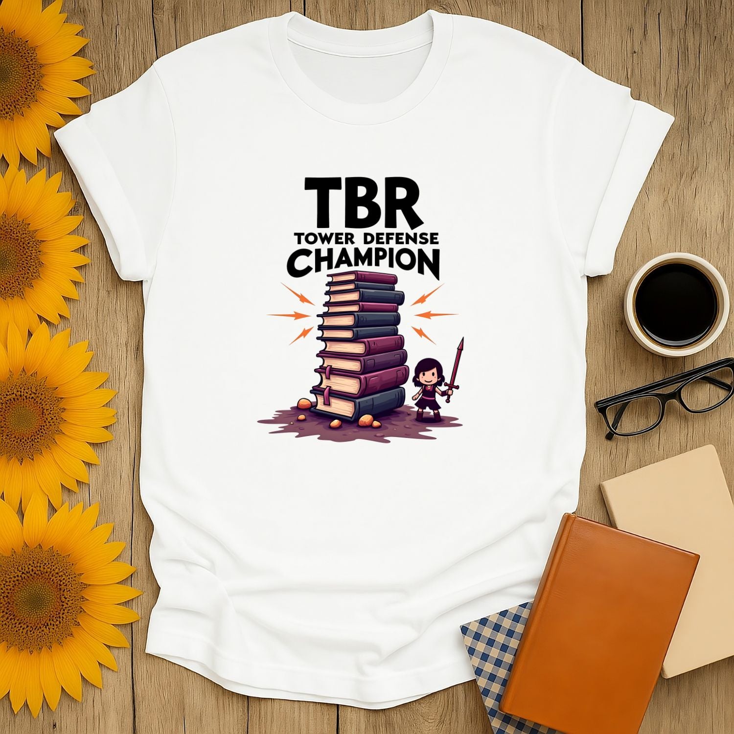 TBR Defender T-Shirt featuring a book stack and tower defense design, perfect for book lovers and gamers.
